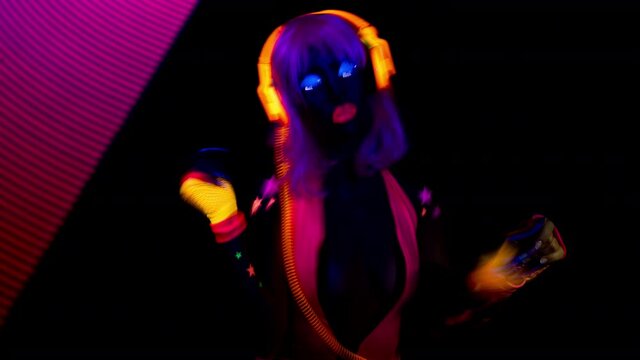 Female dancer in glow UV costume