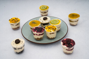 close up of desserts with different flavors on a plate with a marble background