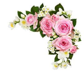 Pink roses, jasmine and spirea flowers in a corner arrangement isolated on white background