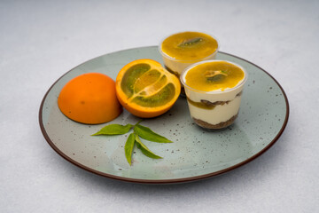 Lulo desserts with leaves on a marble background