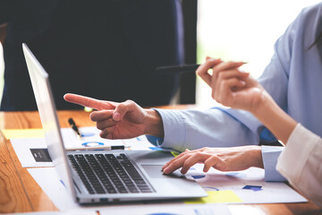 Team work with business analytic price chart on the table at the conference room.