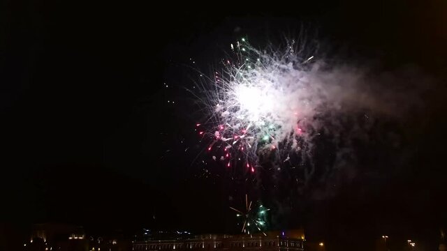 Beautiful fireworks with lots of details of explosions in the night sky in 4k resolution