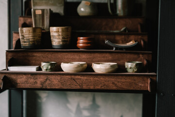 Pottery jugs and cups made of natural clay. Pottery master's workshop. concept is a manual hobby.