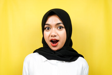 Closeup of beautiful young Muslim woman surprised, shocked, isolated