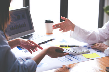 Team work with business analytic price chart on the table at the conference room.