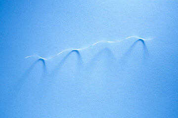 Paper fragments on the textured paper