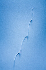 Paper fragments on the textured paper