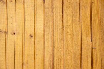 Wooden background texture of natural color boards without paint. The background is made of wood for photography. Concept - background of boards