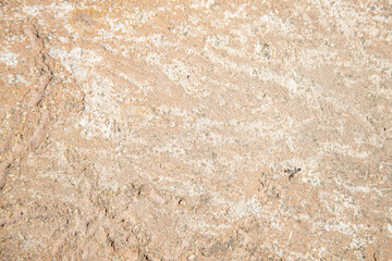 Unusual texture of natural stone with cracks and textures. Natural granite is a mineral stone. Concept - texture for background