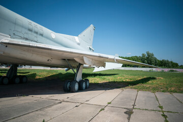The wing of the plane. Hull, chassis, engines and propellers of an old plane. large, cargo, military aircraft with a large payload