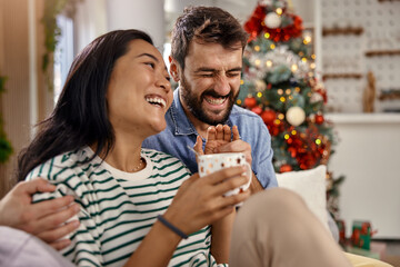 a smiling young couple enjoying moments of happiness