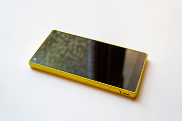 Bright yellow smartphone mockup isolated on white background