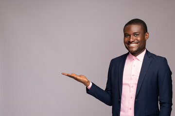 young african businessman holding up his open palm