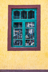 Window on a home in a mountain village.