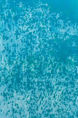 Fototapeta na wymiar background blue concrete wall with splashing water