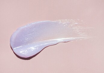 Cosmetic lavender purple gel or foam blurred texture beige background - obrazy, fototapety, plakaty