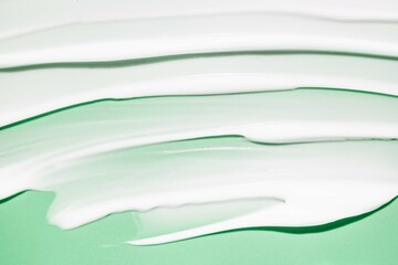 Cosmetic cream mask or balm mint green background
