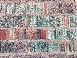 Fototapeta premium retro vintage style ridged weathered red brick wall close view architectural background