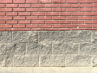 stone block foundation red brick building structure exterior wall architectural background