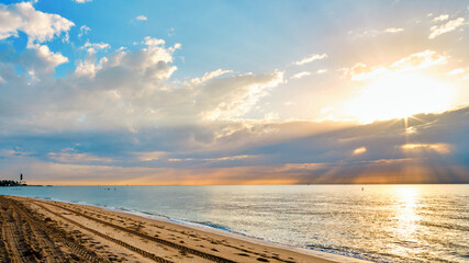 Sunrise with morning clouds over the Atlantic Ocean in Pompano Beach Florida