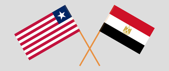 Crossed flags of Liberia and Egypt. Official colors. Correct proportion