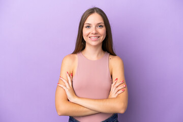 Young Lithuanian woman isolated on purple background keeping the arms crossed in frontal position