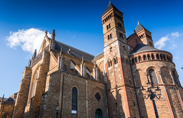 Fototapeta na wymiar Saint Servatius Basilica and the St. John Church at the Vrijthof Square, Maastricht, Netherlands