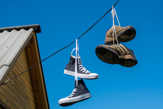 20+ Tennis Shoes On Power Lines Stock Illustrations, Royalty-Free Vector  Graphics & Clip Art - iStock