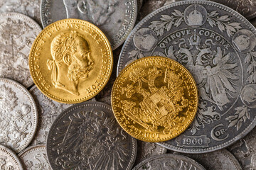 Austro-Hungarian Empire or the Dual Monarchy Gold coins - Close up.Old gold and silver Austrian coins of the 19th century.coin showing austrian emperor Franz Joseph,