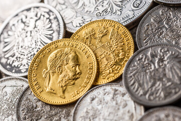 Austro-Hungarian Empire or the Dual Monarchy Gold coins - Close up.Old gold and silver Austrian coins of the 19th century.coin showing austrian emperor Franz Joseph,
