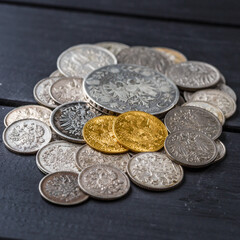 Austro-Hungarian Empire or the Dual Monarchy Gold coins - Close up.Old gold and silver Austrian coins of the 19th century.coin showing austrian emperor Franz Joseph,