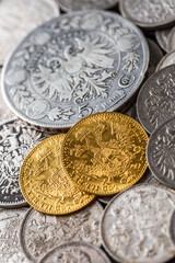 Austro-Hungarian Empire or the Dual Monarchy Gold coins - Close up.Old gold and silver Austrian coins of the 19th century.coin showing austrian emperor Franz Joseph,