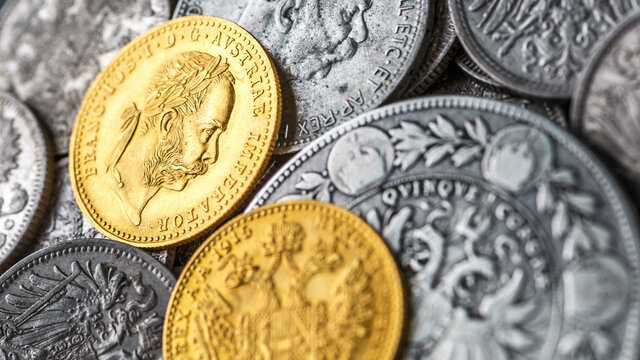 Austro-Hungarian Empire or the Dual Monarchy Gold coins - Close up.Old gold and silver Austrian coins of the 19th century.coin showing austrian emperor Franz Joseph,