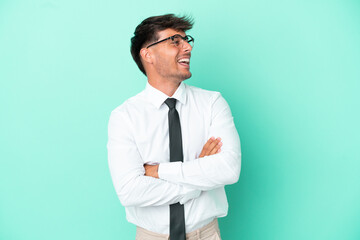 Business caucasian man isolated on blue background happy and smiling