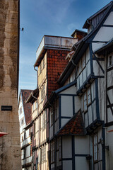 Fototapeta na wymiar Quedlinburg, Germany - October 2021: Ancient street in center of Quedlinburg old town