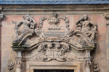 Historical inscription at an ancient door in the city Quedlinburg, Germany