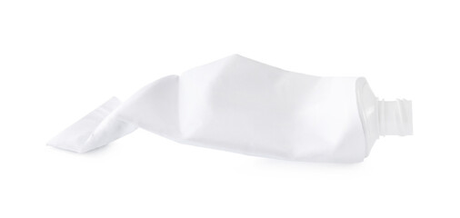 Crumpled tube of toothpaste isolated on white
