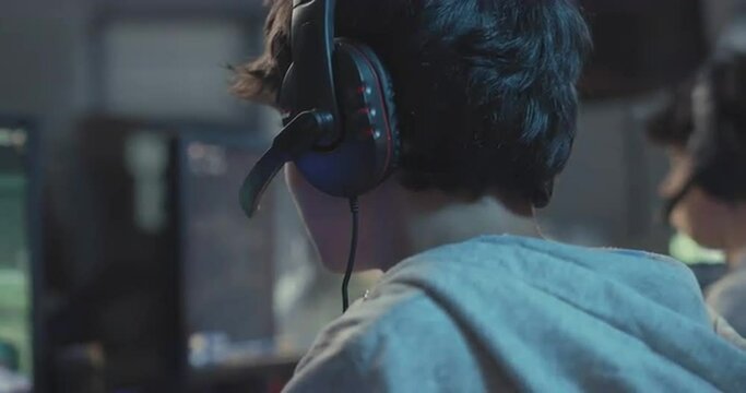 Gamers playing multiplayer video games online