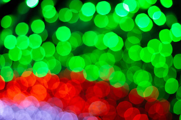 Defocused Red, white and Green abstract bokeh lights background.