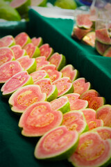 Halved Pink Guava Fruit on Sale in Farmers Market
