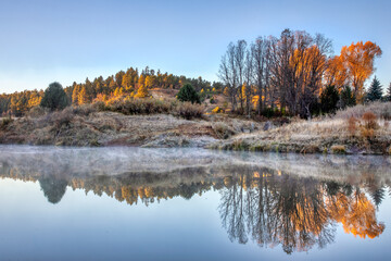 Sunrise across Show Low Creek in the Arizona White Mountains.