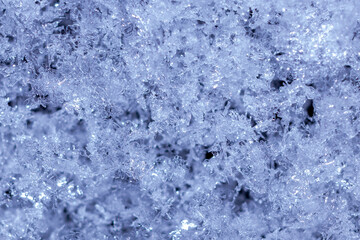 Solid background of transparent snowflakes