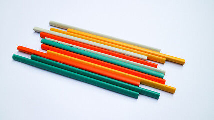 Fototapeta premium Pencils placed on white paper background with copy space for your image or text.