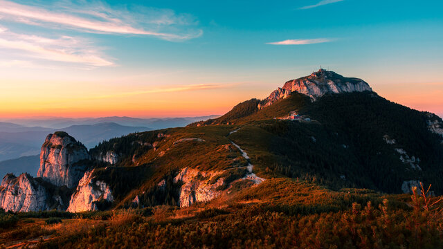 photo of sunset in the ceahlau massif with toaca peek on the right