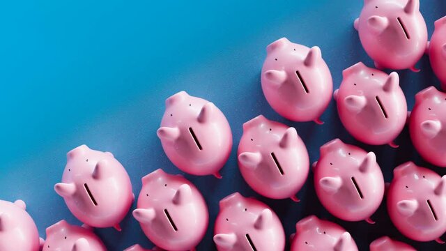 Seamless looping animation of a huge number of piggy banks. Happy toys. Savings.