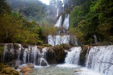 Namtok Thi Lo Su Waterfall largest highest waterfalls at Thailand in jungle forest of Umphang Wildlife Sanctuary for thai people foreign travelers travel visit relax in Umphang city at Tak, Thailand