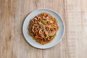 Korean style stir-fried glass noodles pork and vegetables