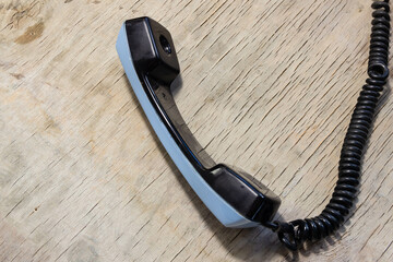 the handset is blue on a black twisted cord