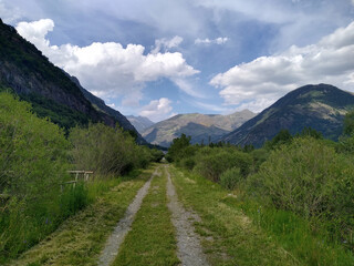 Landscape in the Valley of Boí. View of way near to the River Noguera del Tor. Pyrenees Mountains. Catalonia. Spain.
