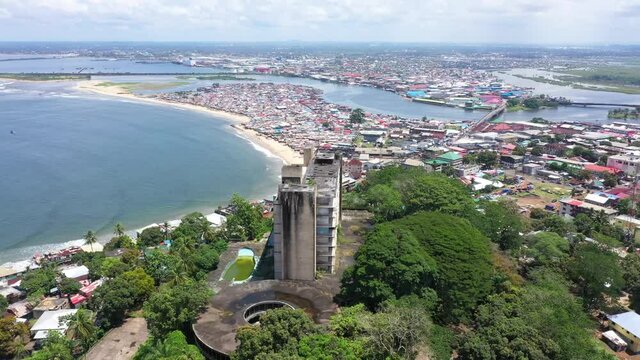 Aerial abandoned Ducor resort hotel Monrovia Liberia circle fast. Liberia coast of west Africa suffers extreme poverty and hunger. Civil war, EBOLA and COVID destroyed the country several times.